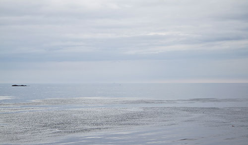 Sølvblått hav og himmel